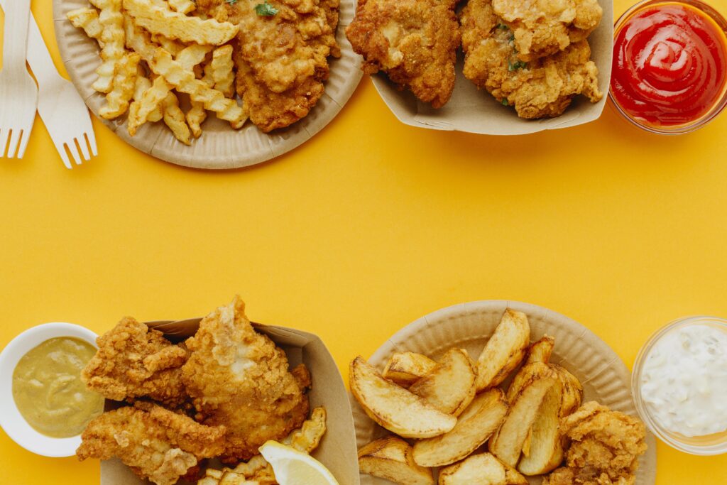 flat-lay-fish-chips-with-copy-space-sauces